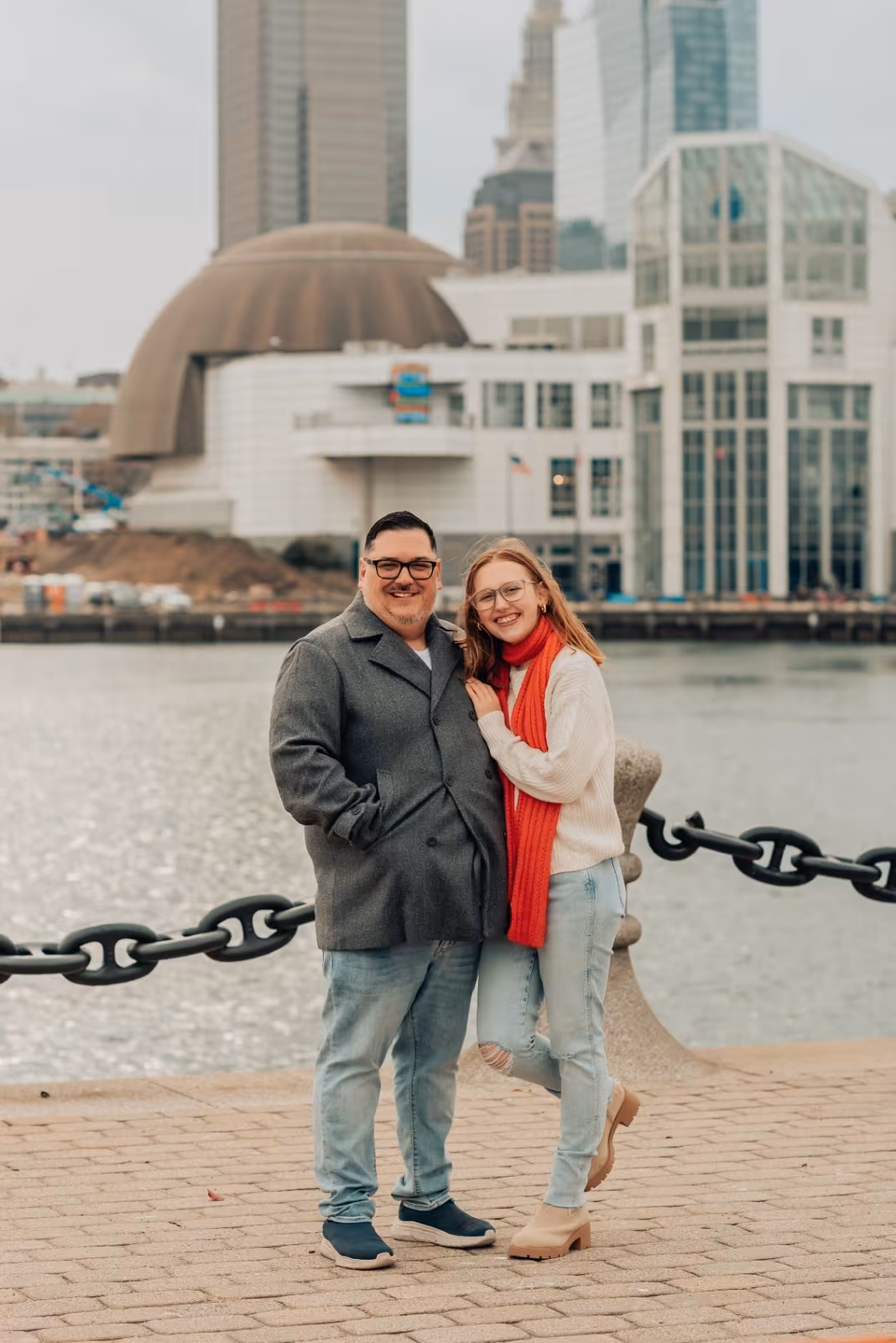 Bishop Whetstone with his daughter, Cleveland skyline behind