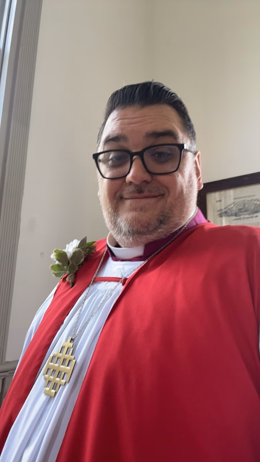 Bishop Whetstone vested in red chimere