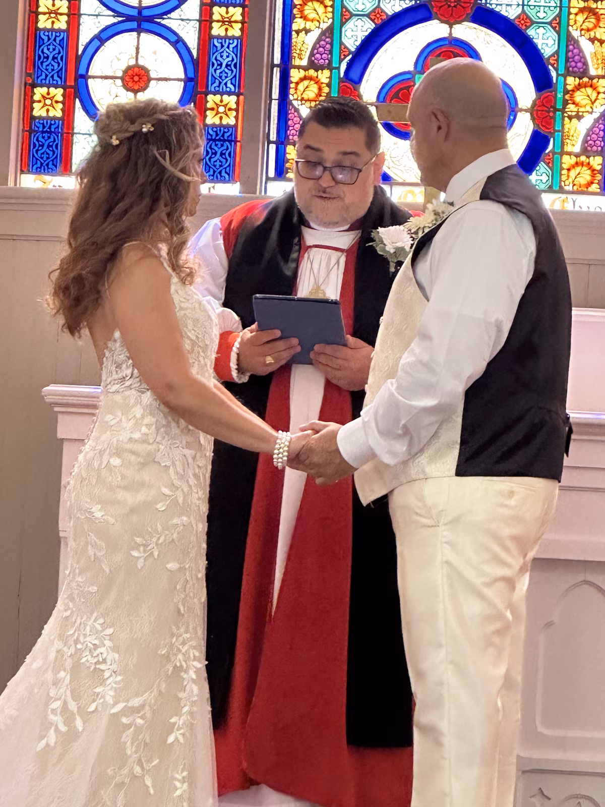 Bishop Whetstone officiating a wedding